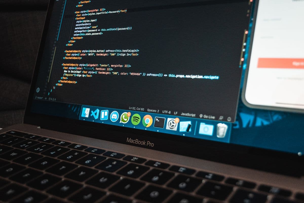 Laptop screen showing lines of website code